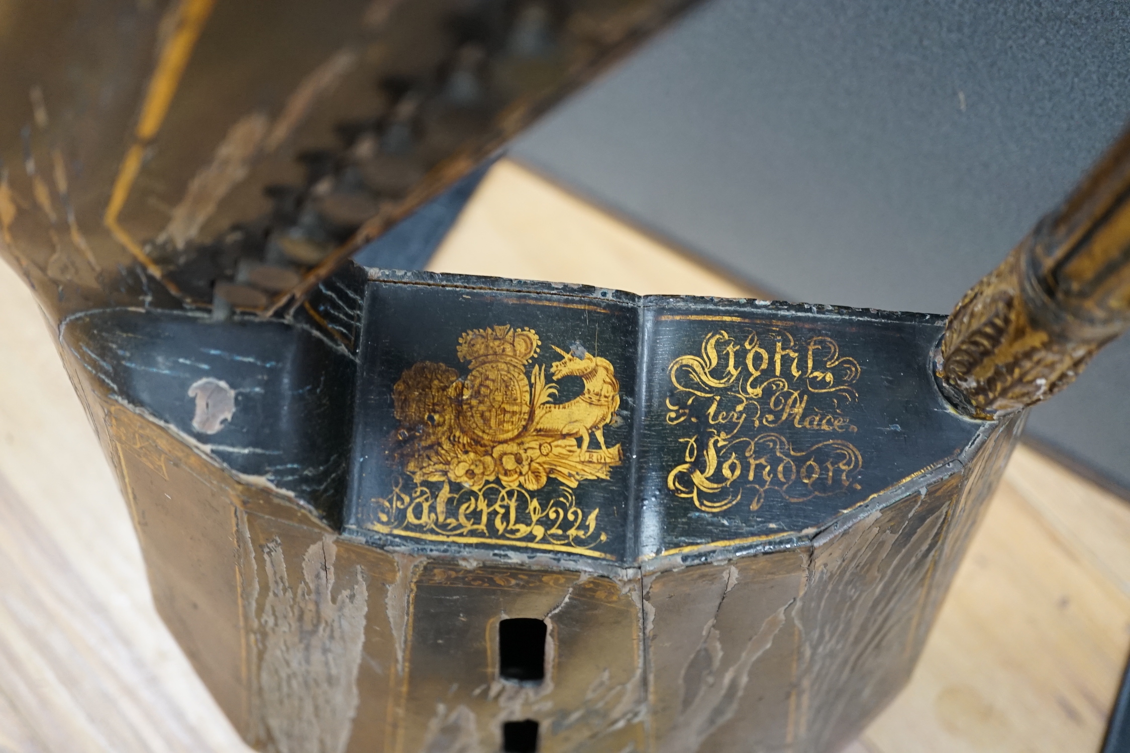 A Georgian parcel gilt and ebonised harp-lute by Edward Light, with fluted pillar, Royal coat of arms above patent number and ‘Light, Toley Place, London’, buttons to reverse with note letters, 88.5cm high CITES Submissi